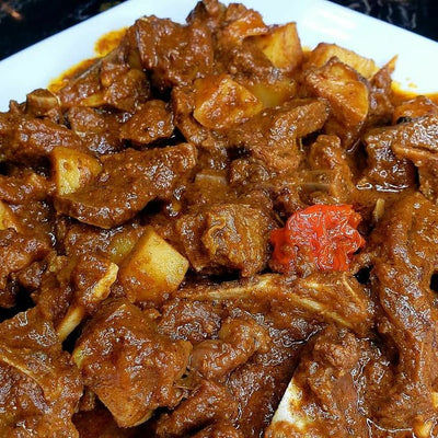 CURRY GOAT