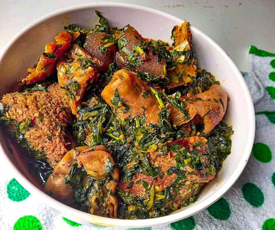 Edikang Ikong (made with Ugu and Water Leaves) With Goat Meat  IN TRAY ( SEASONAL)