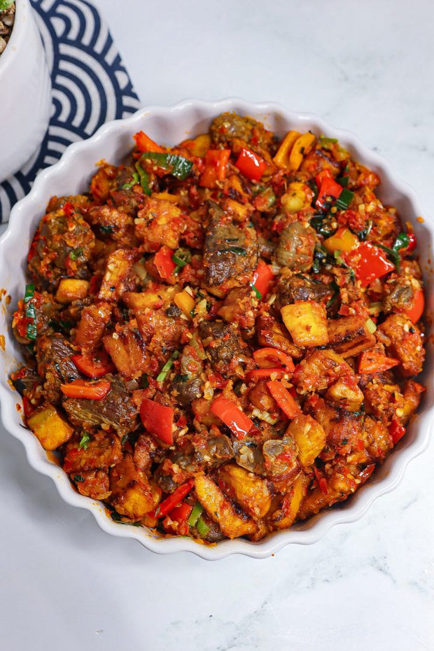GIZDODO (gizzards and plantain “dodo”)  (IN TRAY)